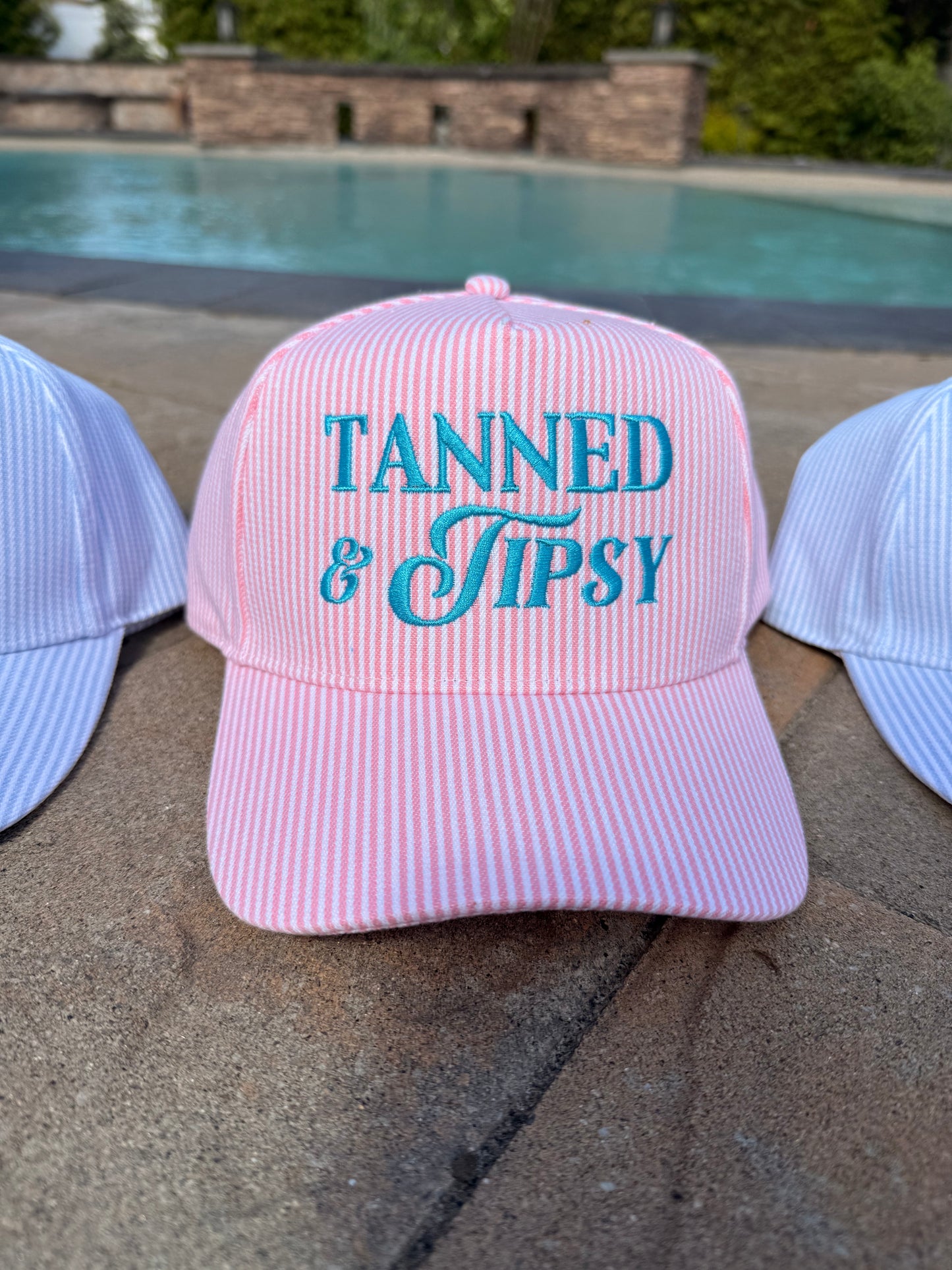 TANNED & TIPSY Embroidered Seersucker Stripe Trucker Hat